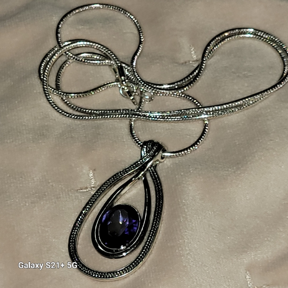 Vintage silver tone necklace with purple glass pendant
